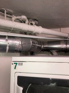 Dryer ductwork in a commercial laundry room